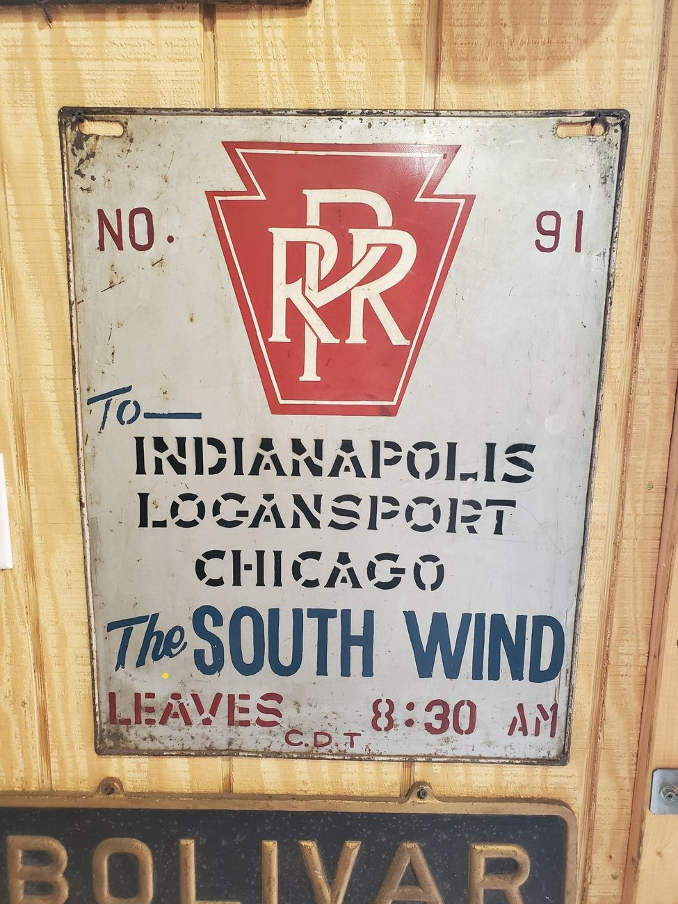 Vintage Pennsylvania Railroad South Wind passenger train sign